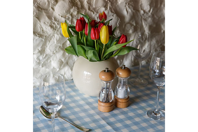 The Clock House's kitchen, vase of flowers