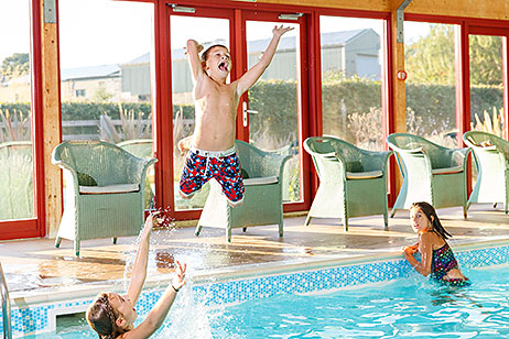 Children enjoying the indoor heated swimming pool at Home Farm cottages